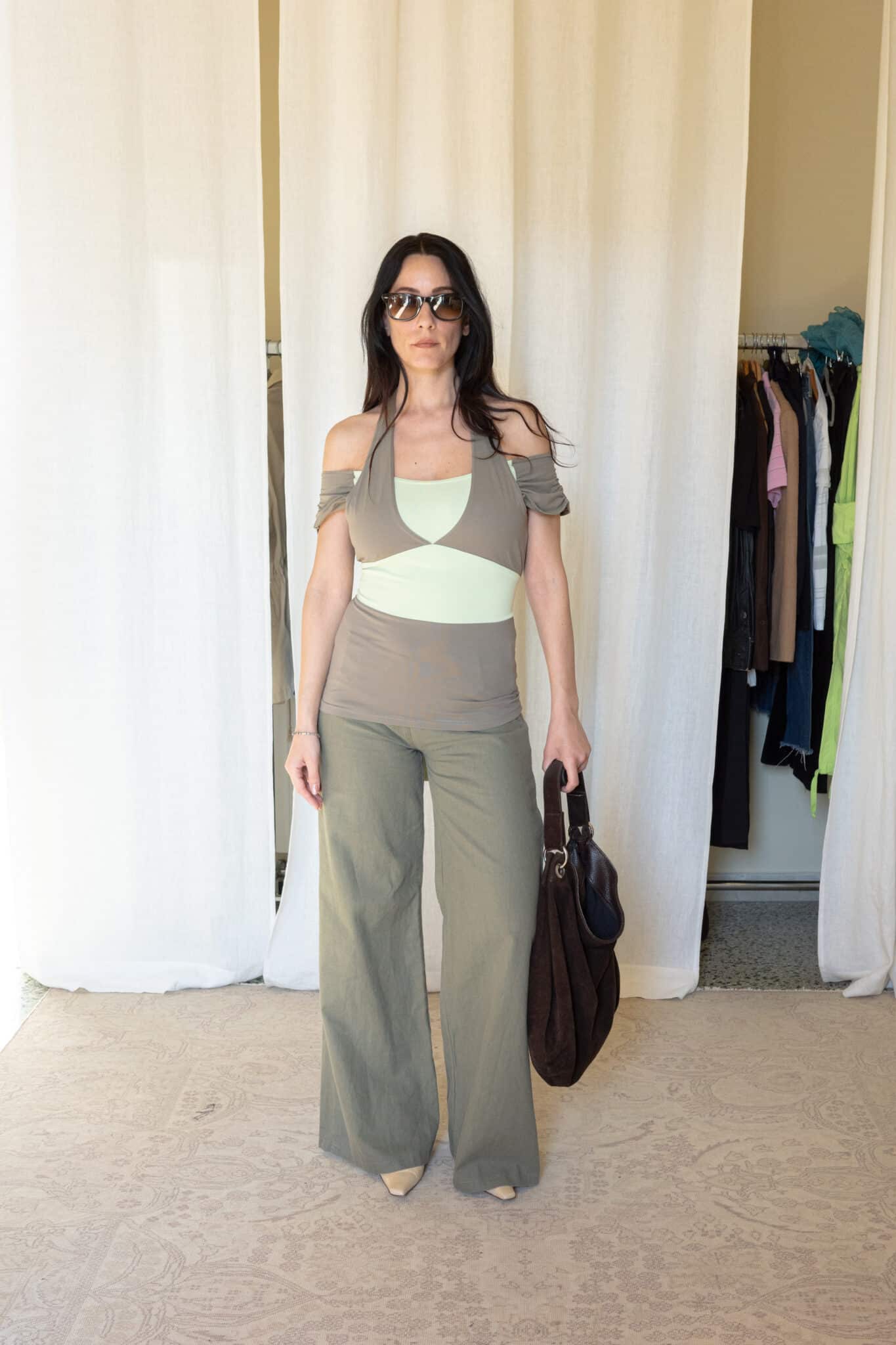Two tone sage wrap halter top with layered contrast panels and adjustable waist tie straps