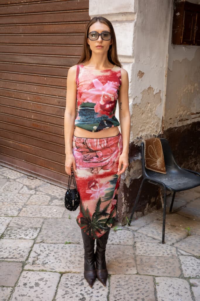 Floral mesh co-ord set with sleeveless top and midi-length skirt.