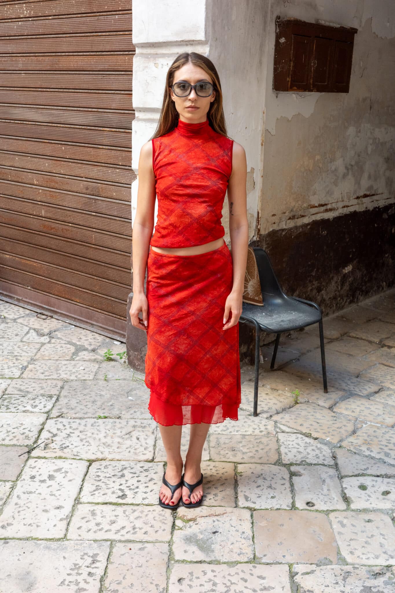 Red mesh two piece skirt set with high neck sleeveless top