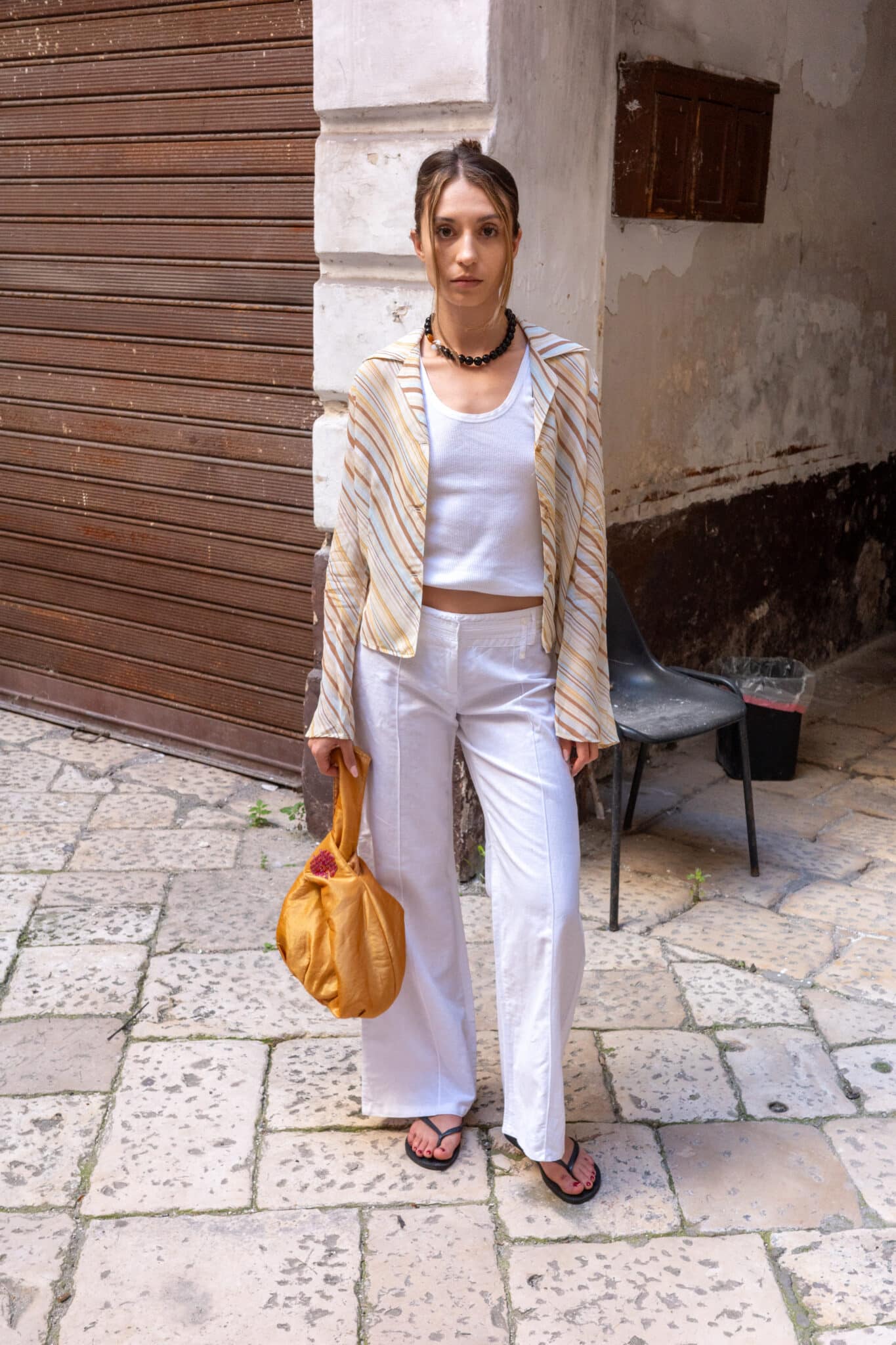 Front view of white wide leg trousers.