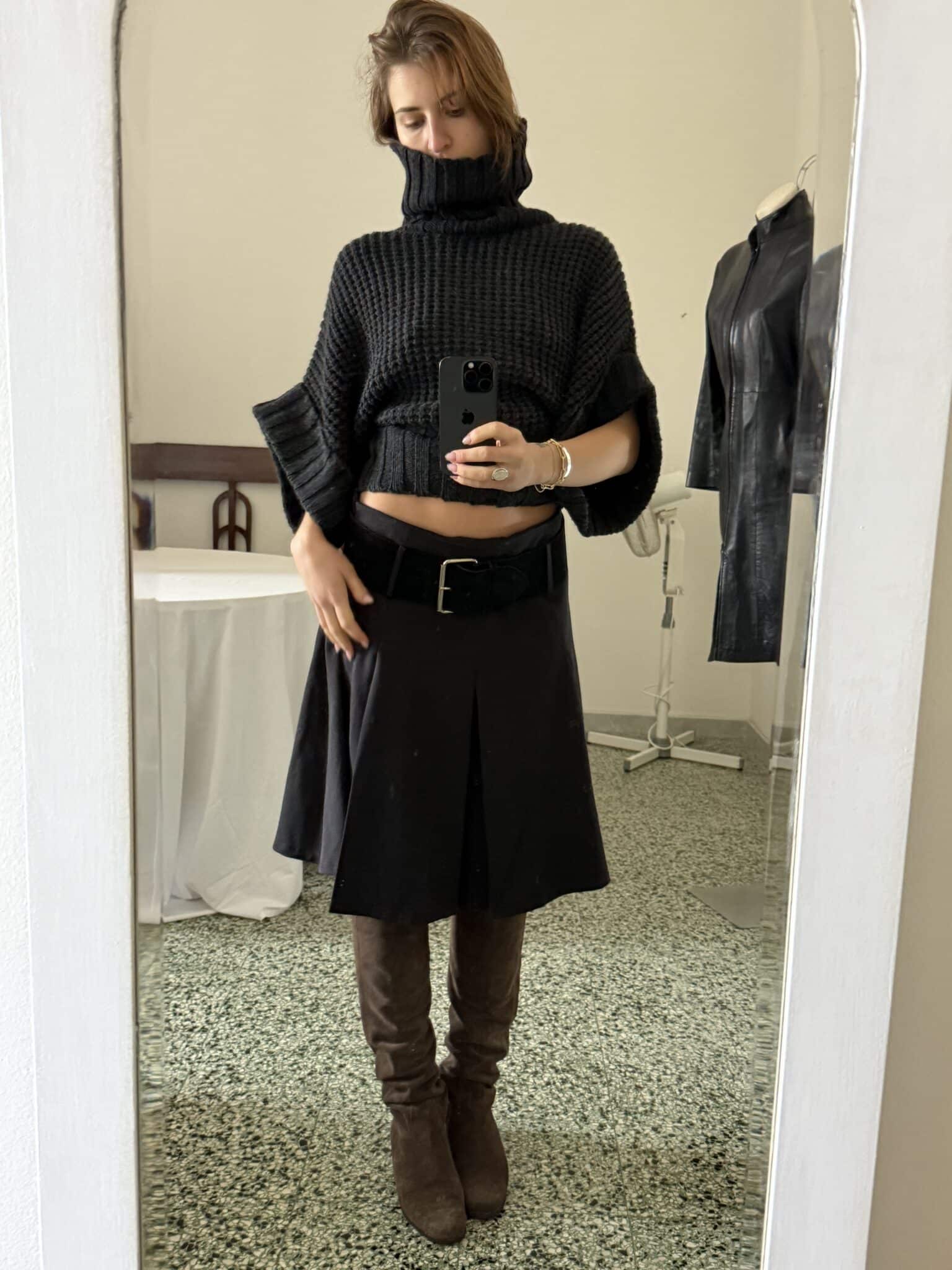Black wool skirt with matching belt and clean A-line silhouette