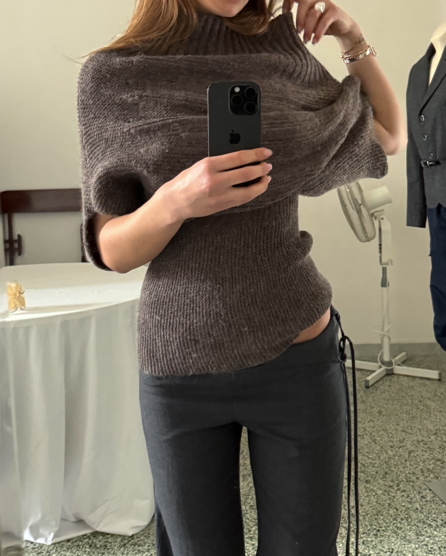 Brown mohair and wool blend sweater with ribbed high neck and relaxed fit