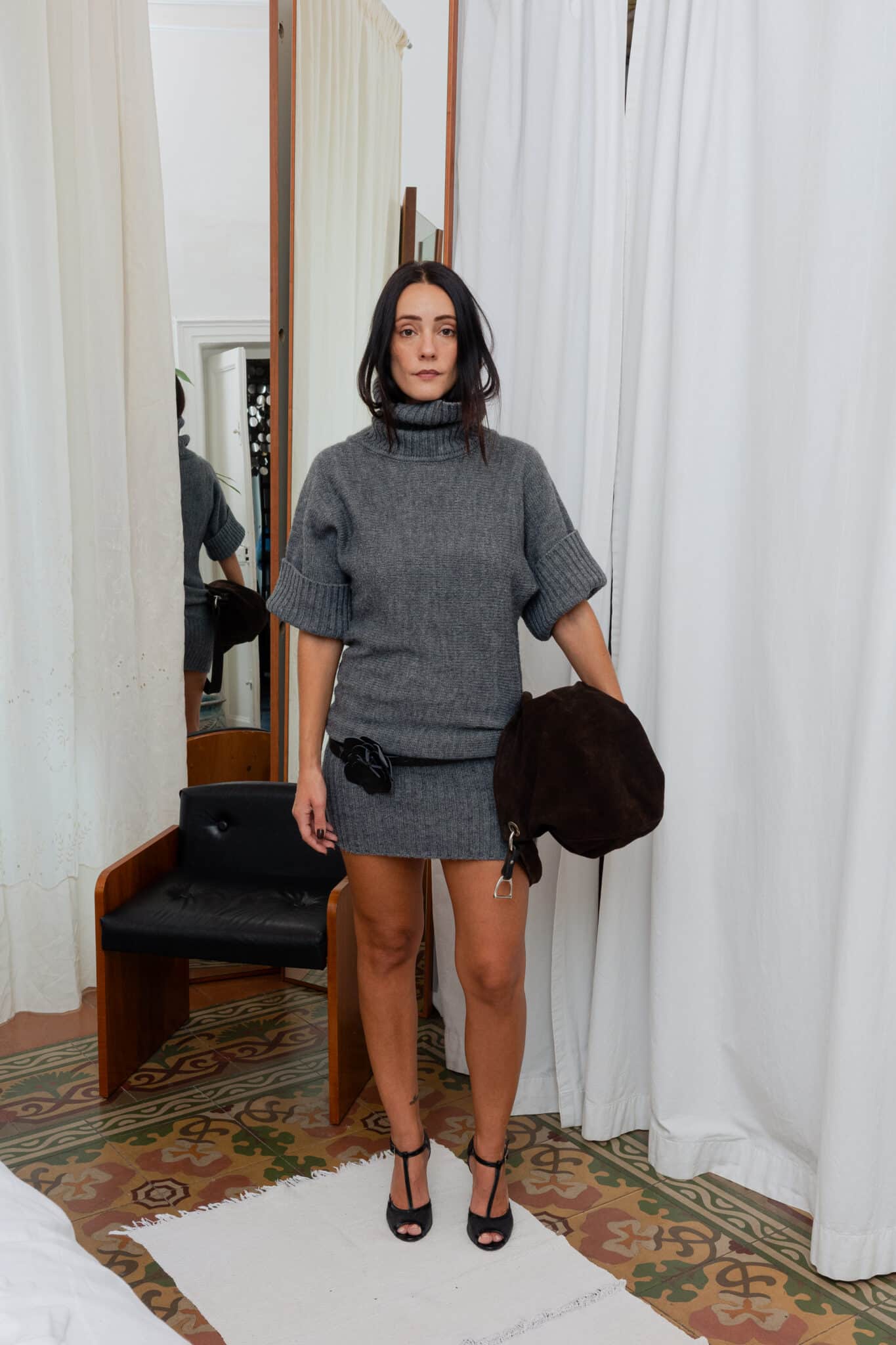 Grey wool knit mini dress with turtleneck and short sleeves.