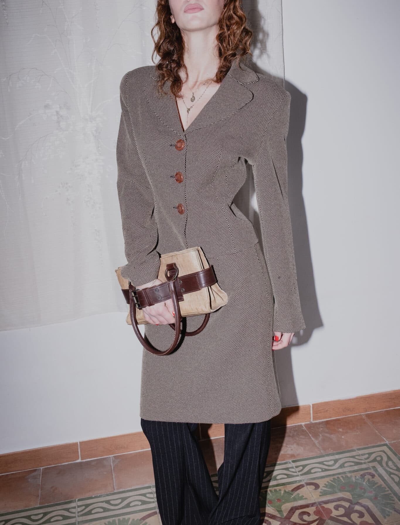 structured blazer with a classic buttoned front